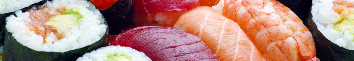 Eating Japanese Seafood Sushi at Domo Sushi restaurant in Toledo, OH.